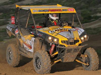 2011.can-am.commander.yellow.front-right.racing.on-dirt.jpg