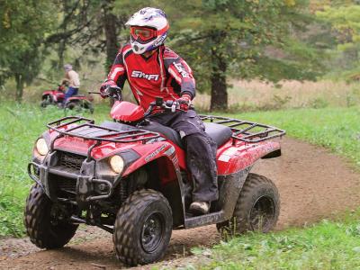 2011.kawasaki.brute-force300.red_.front-left.riding.on-trail.jpg