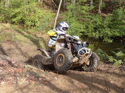 2012.can-am.renegade.front-right.yellow.riding.up-hill.jpg