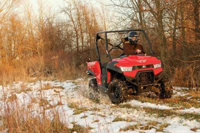 2015.kymco.uxv450i.red.front-right.riding.on-snow.jpg