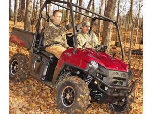 2011.polaris.ranger-xp800.front-right.red_.riding.in-woods.jpg