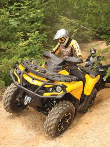 2012.can-am.outlander1000.yellow.front_.riding.up-hill.jpg