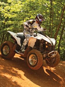 2012.can-am.renegade1000.white_.front-right.riding.wheelie.on-dirt.jpg