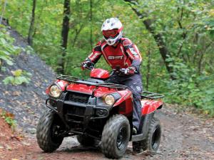 2012.kawasaki.brute-force300.red_.front-left.riding.on-trail.jpg