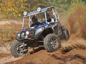 2012.polaris.rzr4_.with-accessories.blue_.front_.riding.on-trail.jpg