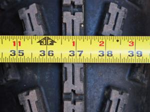 2012.yamaha.raptor.measuring.tire-scrub.close-up.jpg