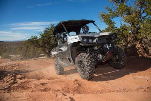 2016.bad-boy-buggy.stampede900-4x4.front-right.riding.on-sand.jpg