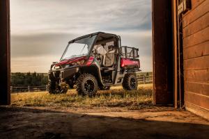 2016.can-am.defender-xt.red_.front-left.parked.on-farm.jpg
