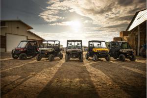 2016.can-am.defender.family.parked.at-farm.jpg