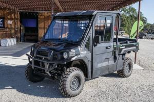 2016.kawasaki.mule-pro-fx.with-cab.green_.front-left.parked.on-gravel.jpg
