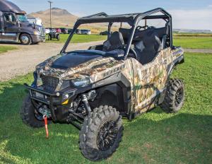  2016.polaris.general1000eps.camo_.front-left.parked.on-grass.jpg