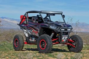 2016.polaris.rzr1000.buckshot-racing.black-and-red.front-right.parked.in-field.jpg