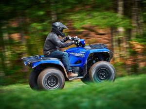 2016.yamaha.grizzly4x4eps.blue_.right_.riding.in-woods.jpg