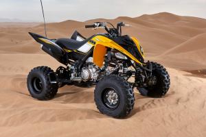 files/2016.yamaha.raptor700r-se.yellow.front-right.parked.on-sand.jpg