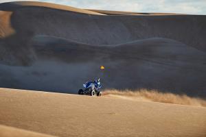 2016.yamaha.raptor700r.blue_.front-left.far_.riding.at-dunes.jpg