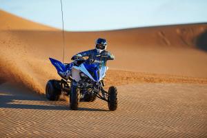 2016.yamaha.raptor700r.blue_.front_.riding.at-dunes.jpg