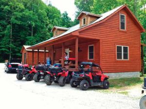location.2015.kentucky.side-x-sides.parked.by-cabin.jpg