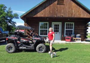 location.2016.north-country-rivers.moxie.polaris-rzr.parked.on-grass.jpg